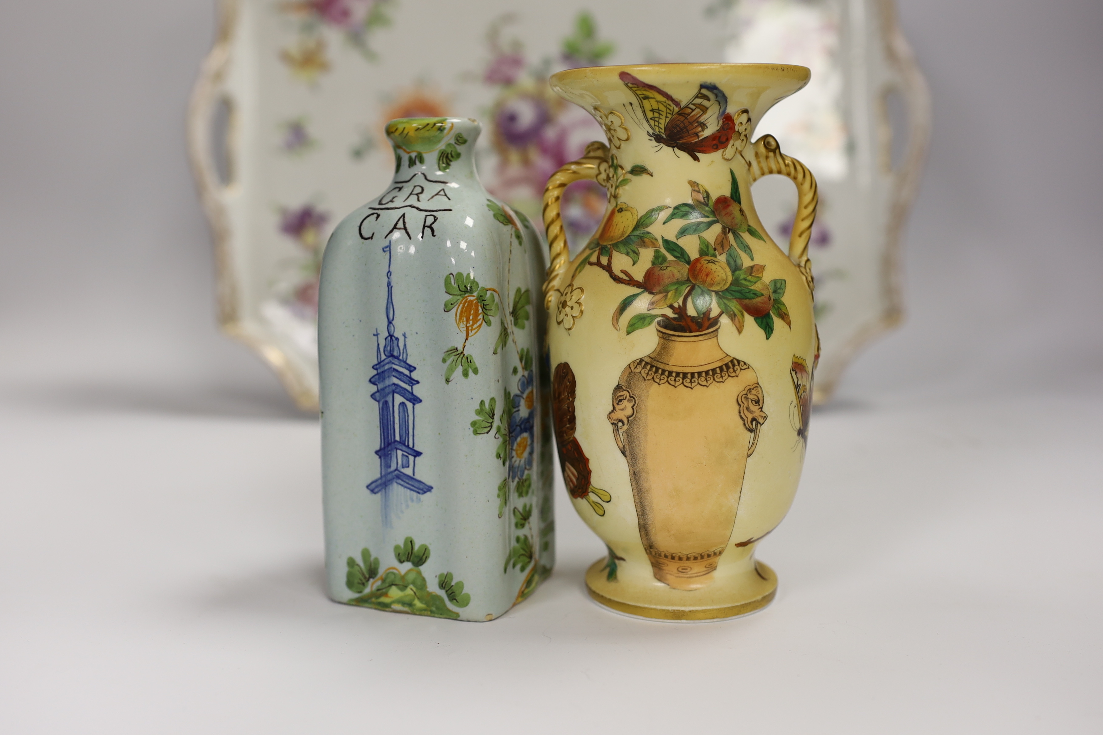 A Dresden porcelain floral dish, Cantagalli caddy and three Paris vases, largest 33cm wide